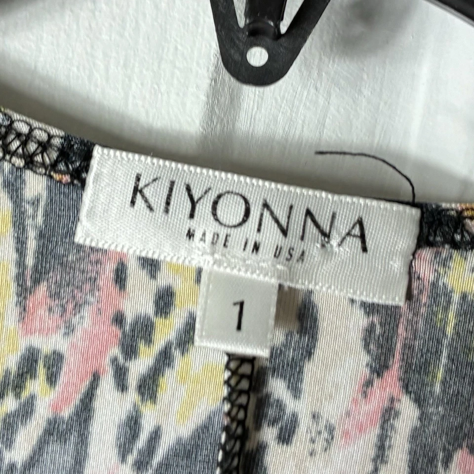 Nuevo sin etiquetas Vestido envolvente Kiyonna EE. UU. 1x Estampado geométrico elástico talla grande Jersey de viaje Foto 2 de 4