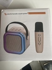 This Wireless Mini Bluetooth Karaoke Machine with Microphone Is Perfect