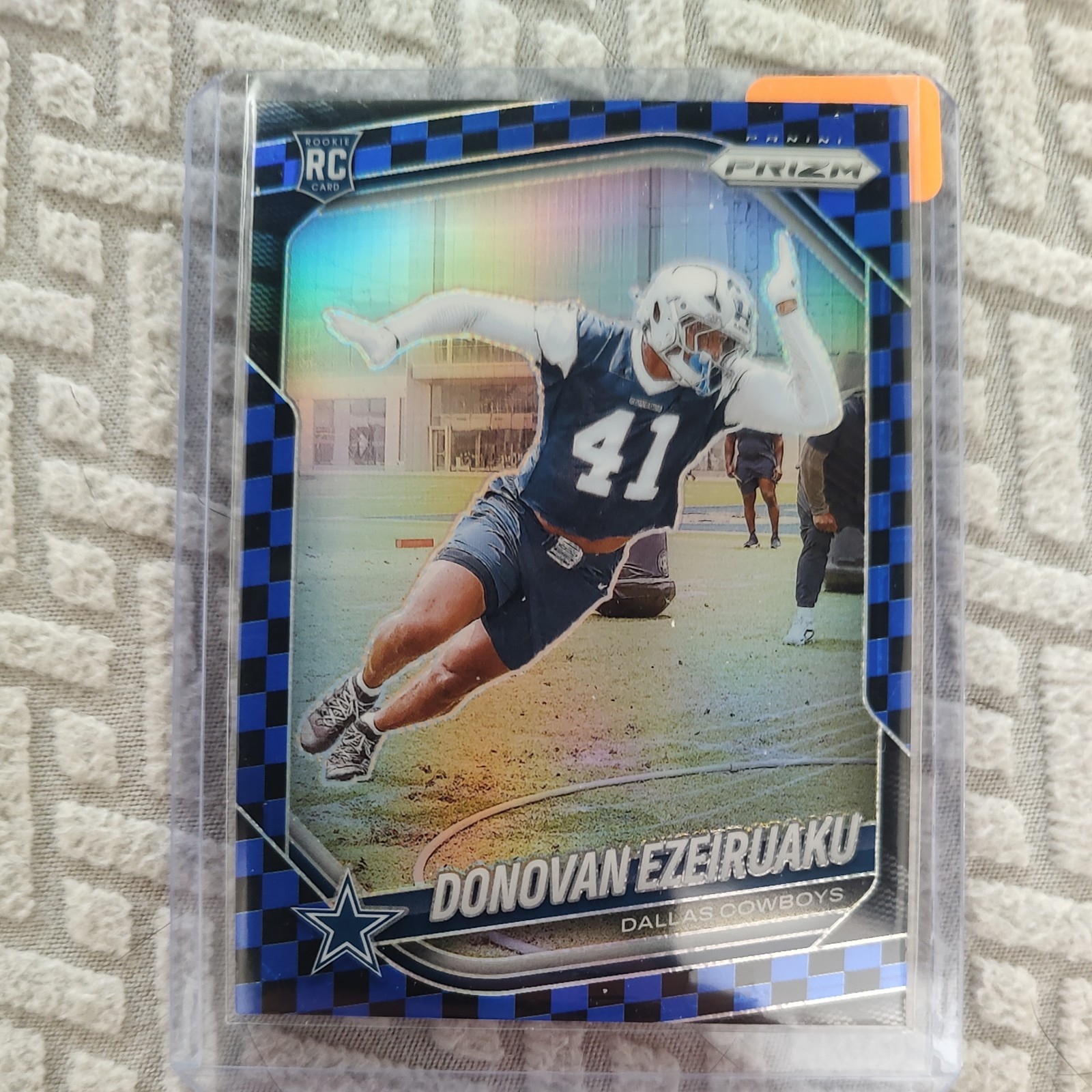 2025 Panini Prizm #314 Donovan Ezeiruaku RC Black and Blue Checker SSP Cowboys