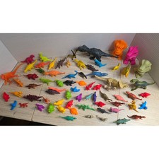 Huge lot of Dinosaurs assorted sizes colors and types some vintage some modern