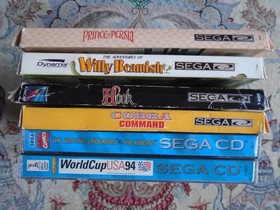 Collection of Sega CD games. lot hook willy beamish prince amazing spider-man