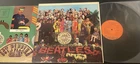 The  BEATLES / SGT. PEPPERS orange label SMAS-2653 w/insert plays solid NM