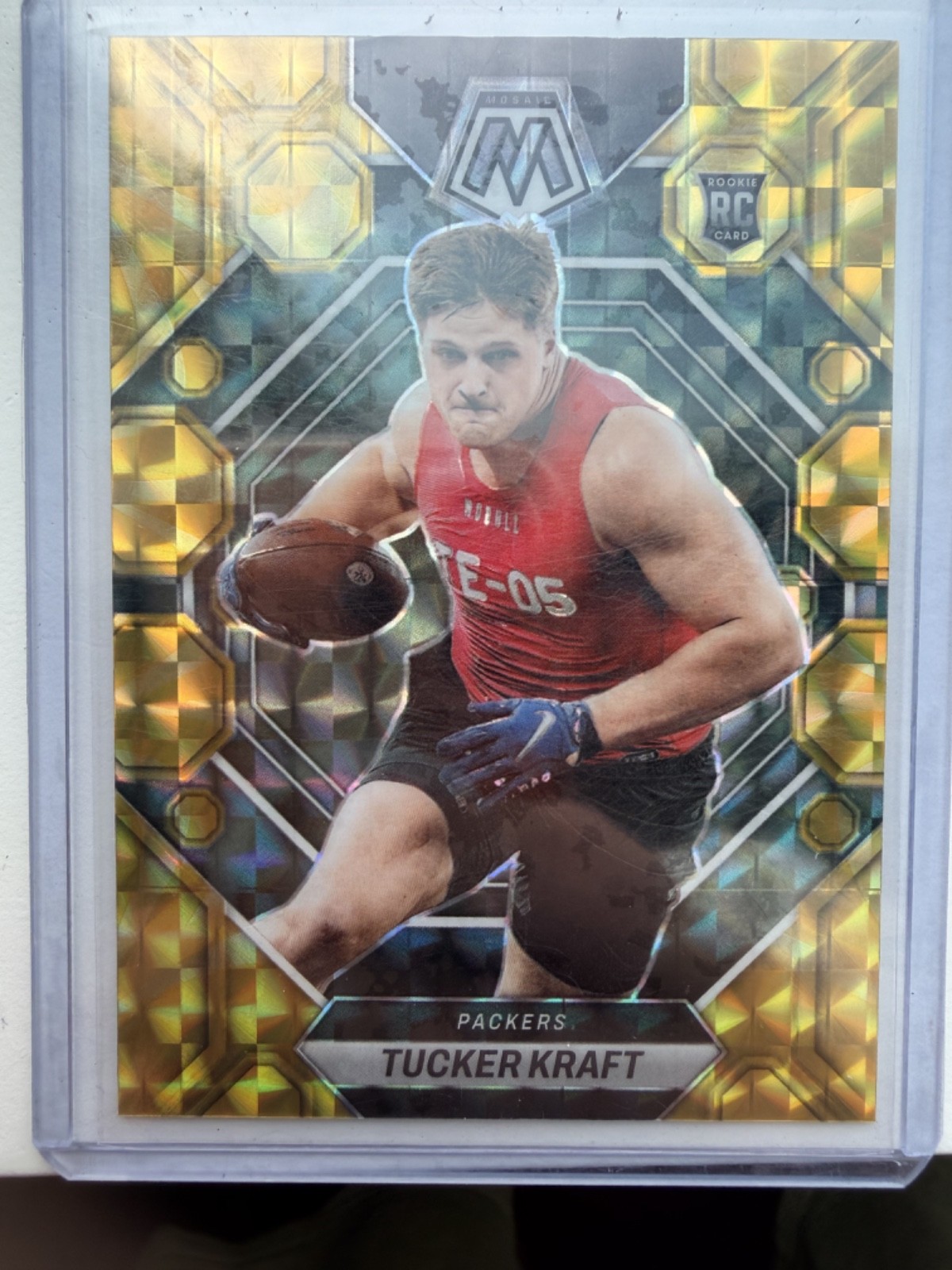 2023 Panini Mosaic - Rookies Tucker Kraft #368 Reactive Yellow Mosaic Prizm (RC)