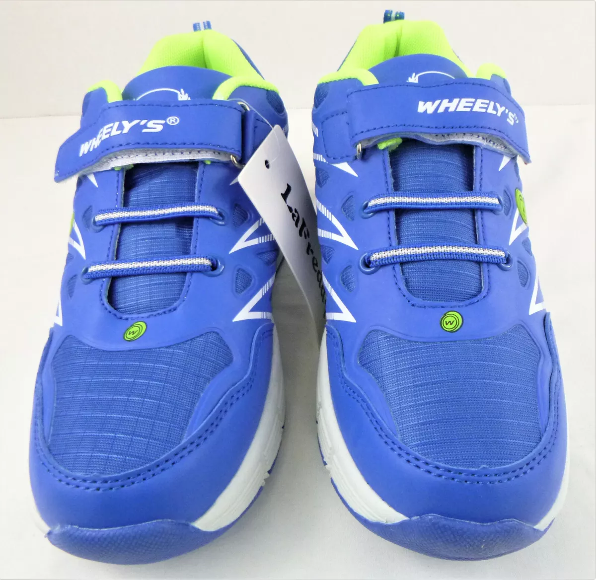 Sneakers with shop pop out wheels