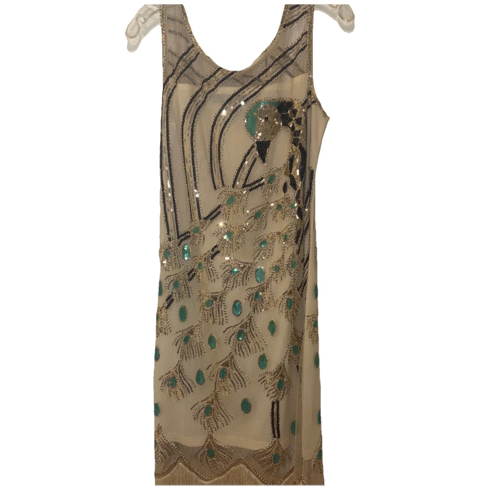 Vestido con solapa años 20 pequeño lentejuelas doradas y cuello de malla Foto 3 de 4