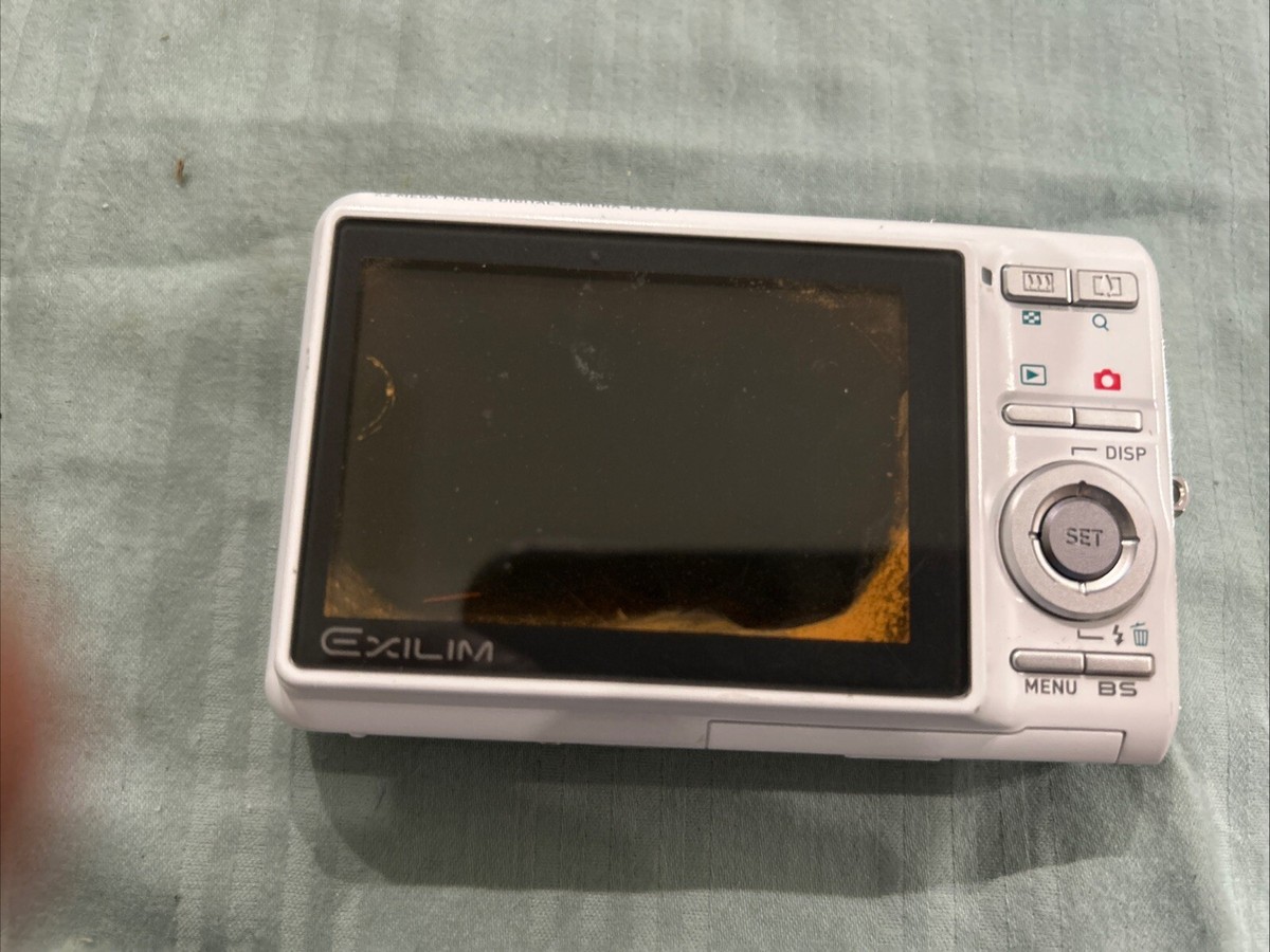 Casio EXILIM ZOOM EX-Z70 7.2MP Digital Camera - white and silver