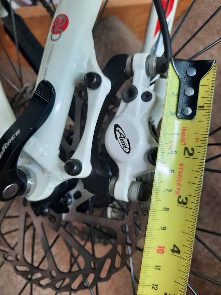 WHITE AVID JUICY THREE HYDRAULIC BRAKES FRONT AND REAR GOOD USED