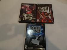 Guitar Hero 1,2 & Rock Band For Ps2 in Very Good  Condtion   With Manual  
