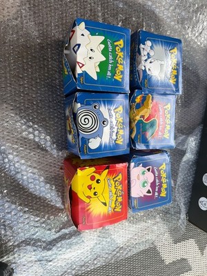 1999 23 k gold plated pokémon cards in box.