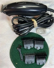 ANDIS PIVOTPRO ELECTRIC HAIR TRIMMER WITH FOUR ATTACHMENTS 