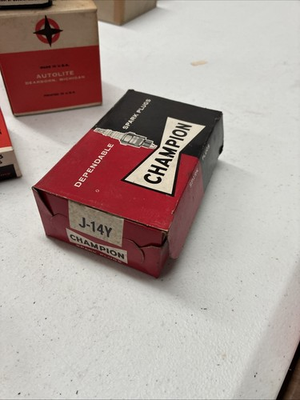 #ad 10 Champion Spark Plugs J – 14 Y $35.00