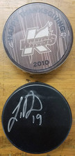 Kalamazoo Wings Hockey Pucks - Thanksgiving and Black Game Puck - Used 2010