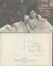 Girl with tea on Christmas morning EA Schwerdtfeger Co Children Infants Holiday