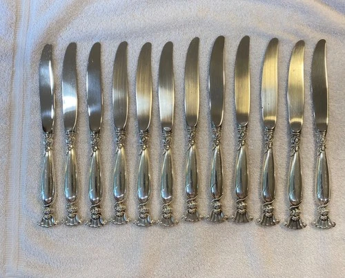 12. 9 inch sterling with stainless blade, Romance of the sea by Wallace knives,