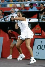 Monica Seles of Yugoslavia hits a return at a women's singles matc- Old Photo 8