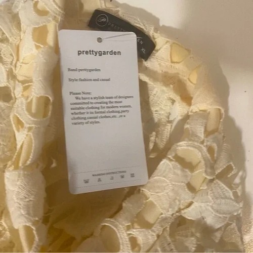 Neu mit Etikett Pretty Garden elfenbeinfarben Häkelspitze angedeuteter Rollkragen asymmetrischer Saum Topper Si - Bild 9 von 10