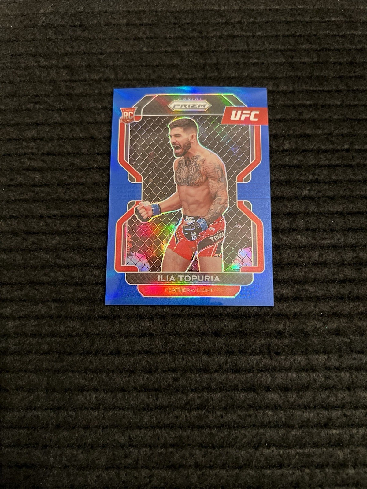 2022 UFC Panini Prizm Ilia Topuria Blue Refractor 141/199 RC
