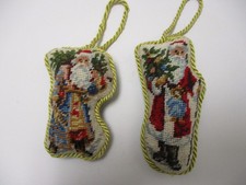 Two Needlepoint Santa Ornaments Finished Holding Christmas Trees
