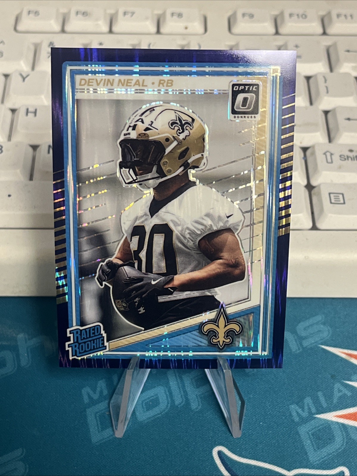 2025 Panini Donruss Optic - Rated Rookie Devin Neal #282 Purple Shock Prizm (RC)