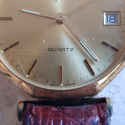 Montre Homme JYB Occasion - Mécanique à Remontage Manuel, Boîtier Acier, Bracelet Tissu/cuir, Vendue En L'état