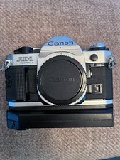 Vintage Canon AE-1 SLR Film Camera Includes Zoom lens and Flash - Black