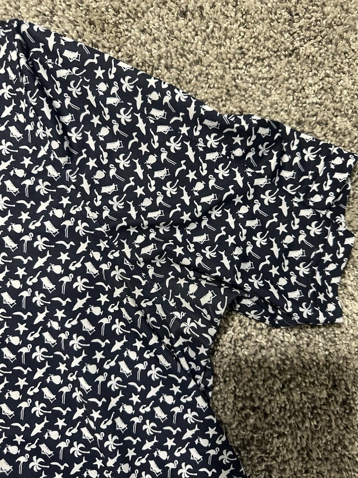 Polo de golf Footjoy ajuste atlético estampado de vibraciones de playa azul marino para hombre talla XL Foto 4 de 4