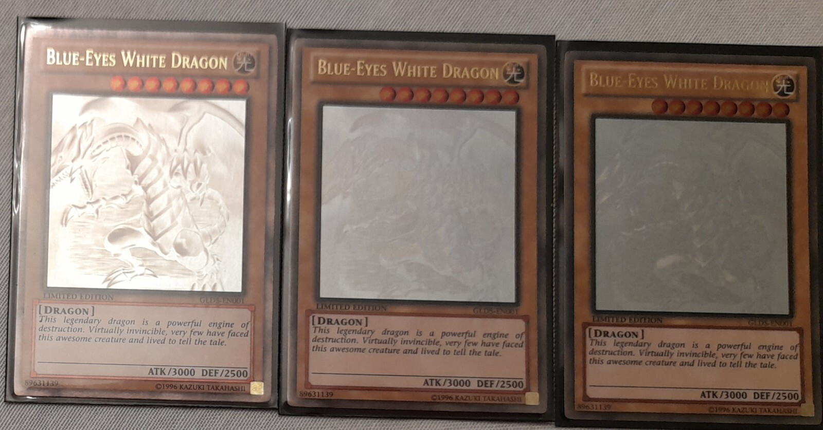 BlueEyes White Dragon Ghost Rare Holo Foil NM To MINT GLD5EN001