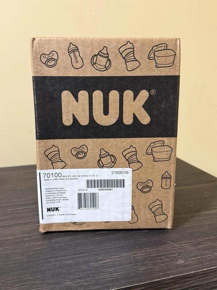 Biberón anticólicos de flujo suave NUK, 10 OZ, paquete de 4, elefante, 4 unidades  Foto 2 de 4