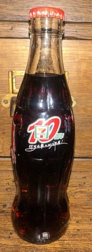 Vintage Coca Cola China Commemorative 10 Years 7-11 Bottle 2002