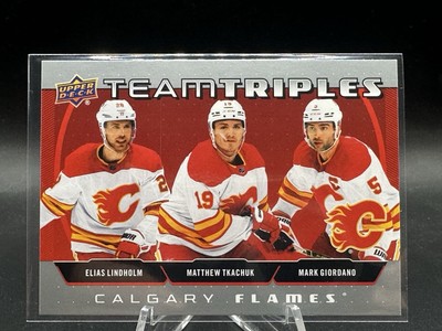 2021 Series 1 Team Triples Elias Lindholm Matthew Tkachuk Mark Giordano #TT-CAL