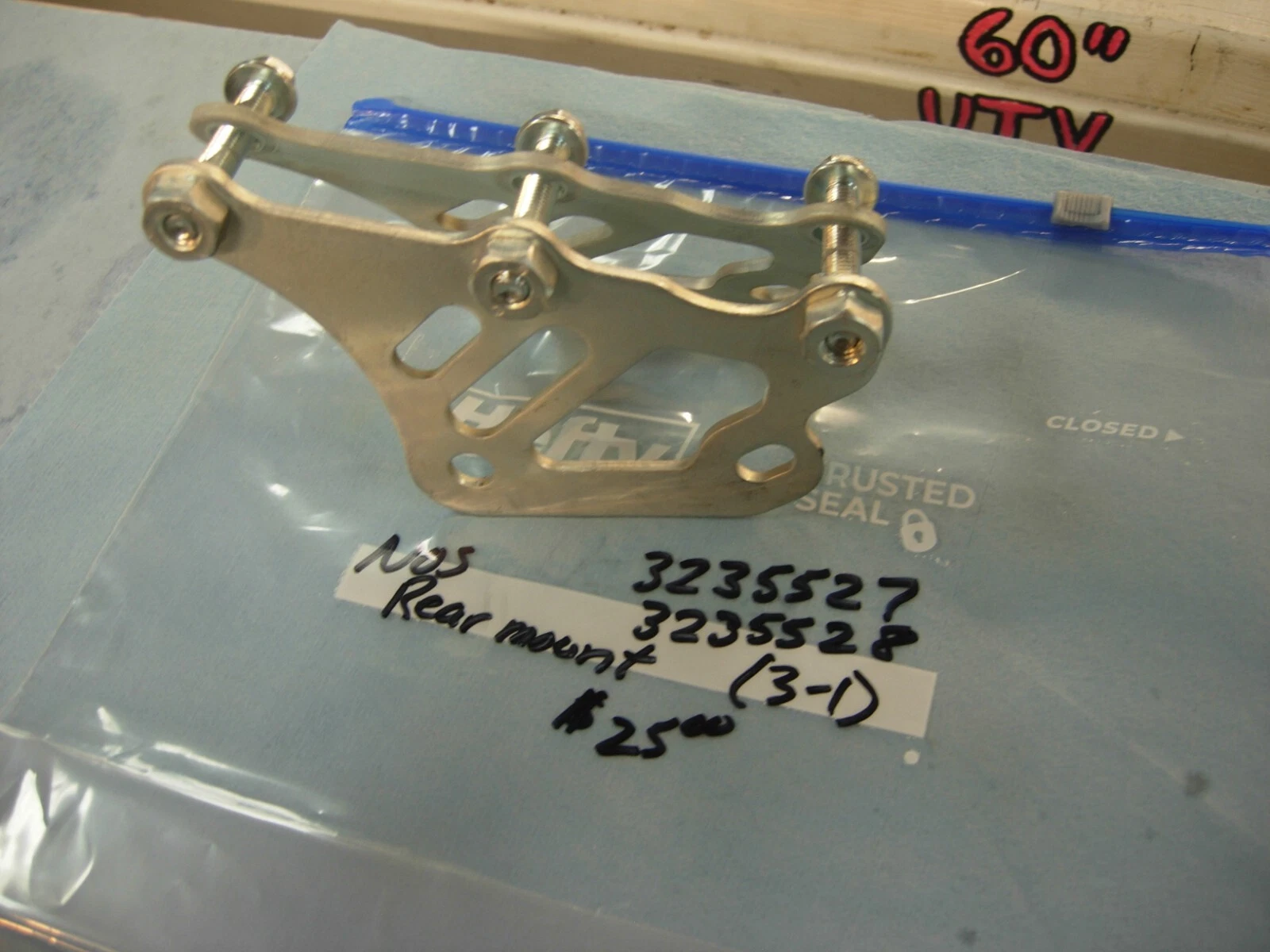 BRACKET, REAR MOUNT