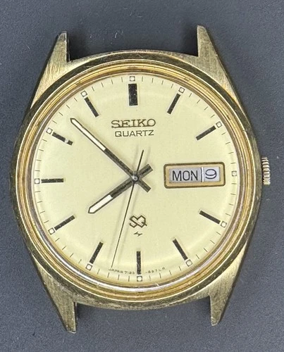 Vtg Seiko SQ Watch Men 35mm Silver Tone 7123-8429-P Day Date New Battery 7.25"