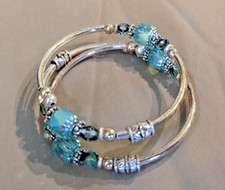 NEW Silver colored metal Coil Bracelet With L...
