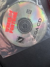 Sega CD video game disc titled 'Wheel of Fortune”