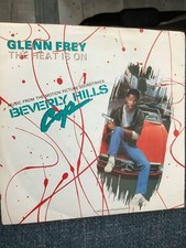 Glenn Frey.  The heat is on.       7 single ....