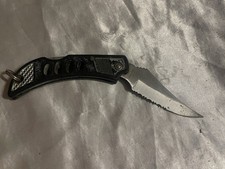 Maxam Falcon Pocketknife Black Plastic Handle Serrated Clip Point Blade