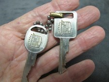 B-Vtg 2pc Stainless Steel GM Cadillac Keys Letters H E