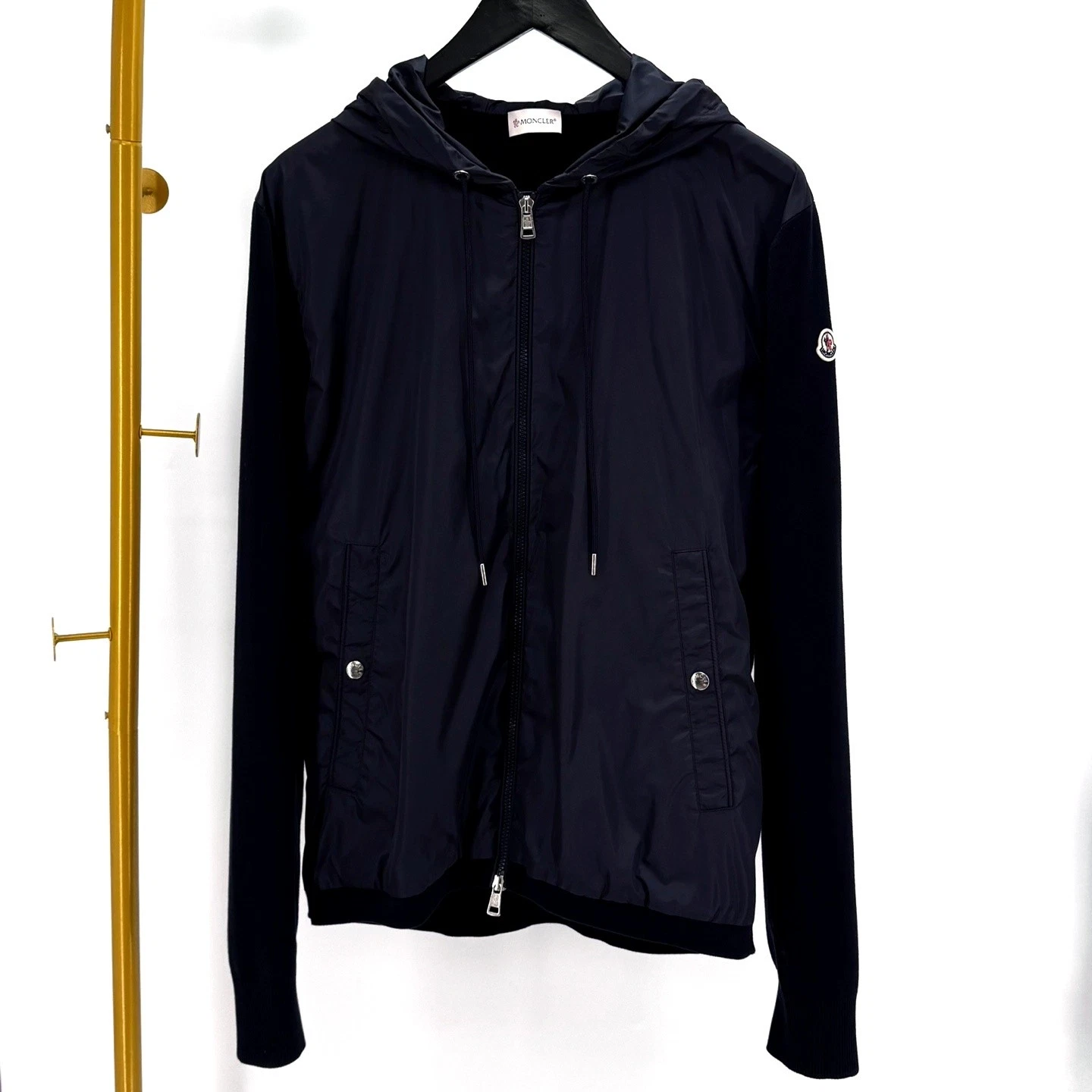Moncler giacca a vento in maglia con cappuccio blu navy 130937798