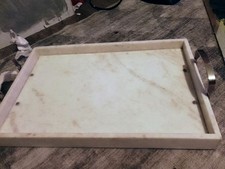 White marble tray with stainless steel handles