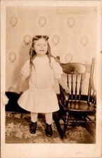 RPPC Postcard Portrait of Young Girl White Dress Black Shoes Child Chair 12450