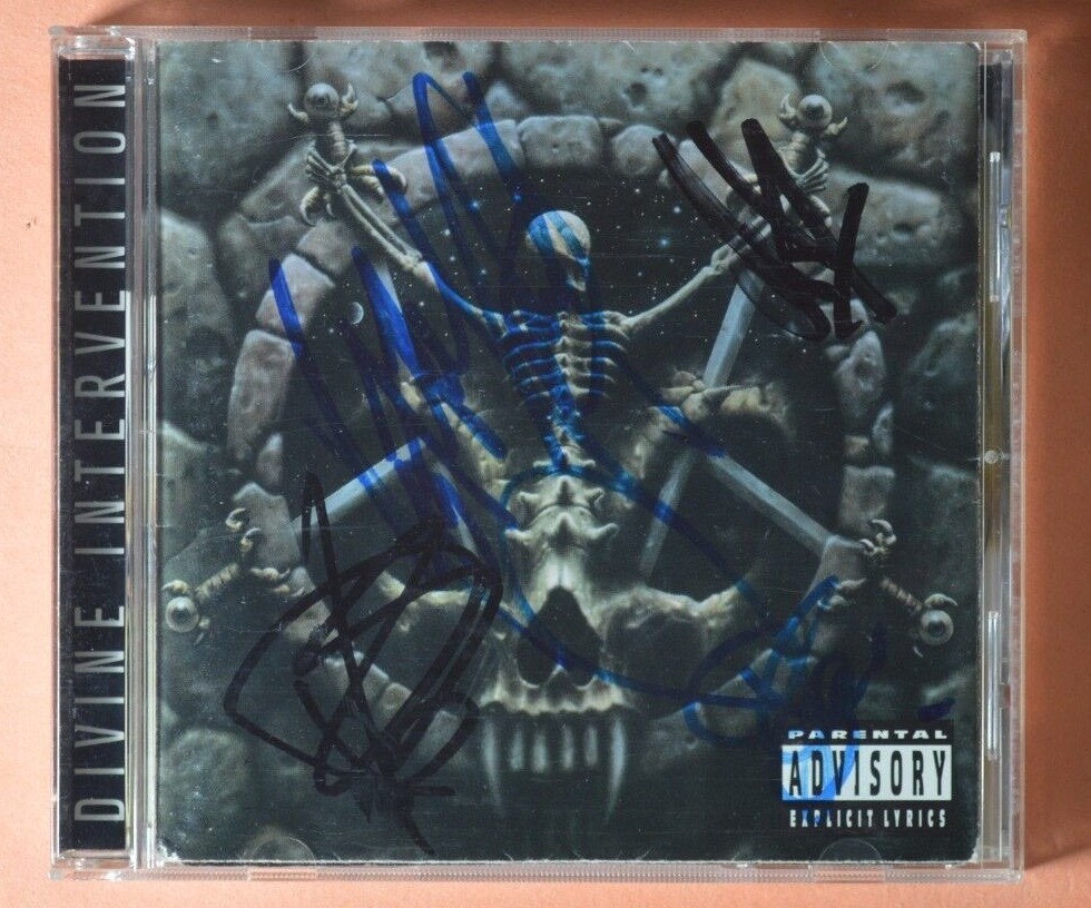 洋楽 SLAYER DIVINE INTERVENTION Divine Intervention by Slayer (1994-08-04) - Amazon.com Music