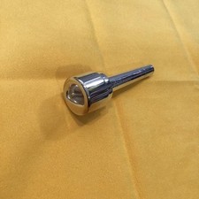 a Asymmetric trumpet mouthpiece