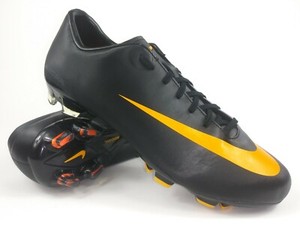 nike black and orange cleats