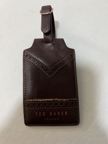 Ted baker London well traveled luggage tag
