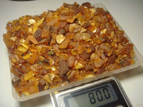 Premium stock video - Natural baltic amber stones on a black background-8