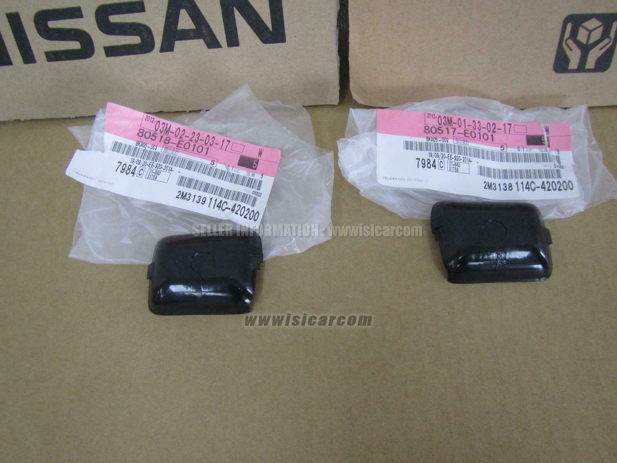 A DATSUN 240Z 1970-1978 DOOR HANDLE ESCUTCHEON SET LH RH 80517-E0101