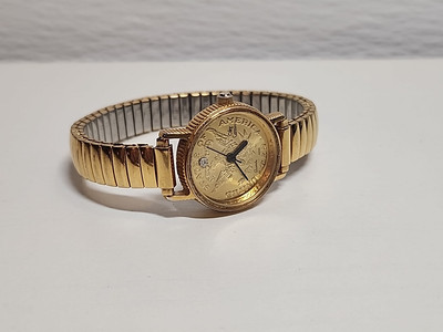 Vintage Genuine Diamond Oleg Cassini Womens Gold Tone Ten Dollar Watch Gold Band