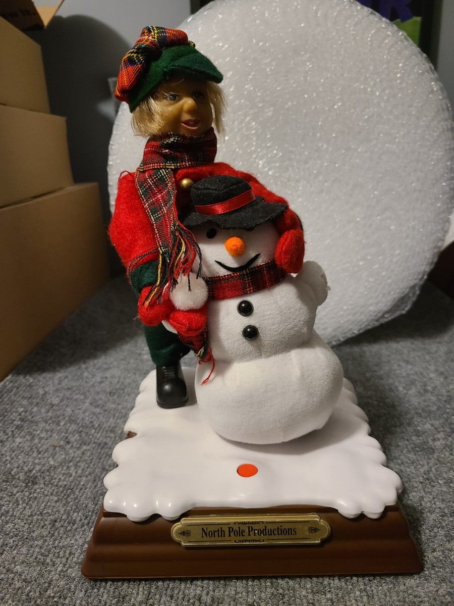Animated Boy Building Snowman While Singing 