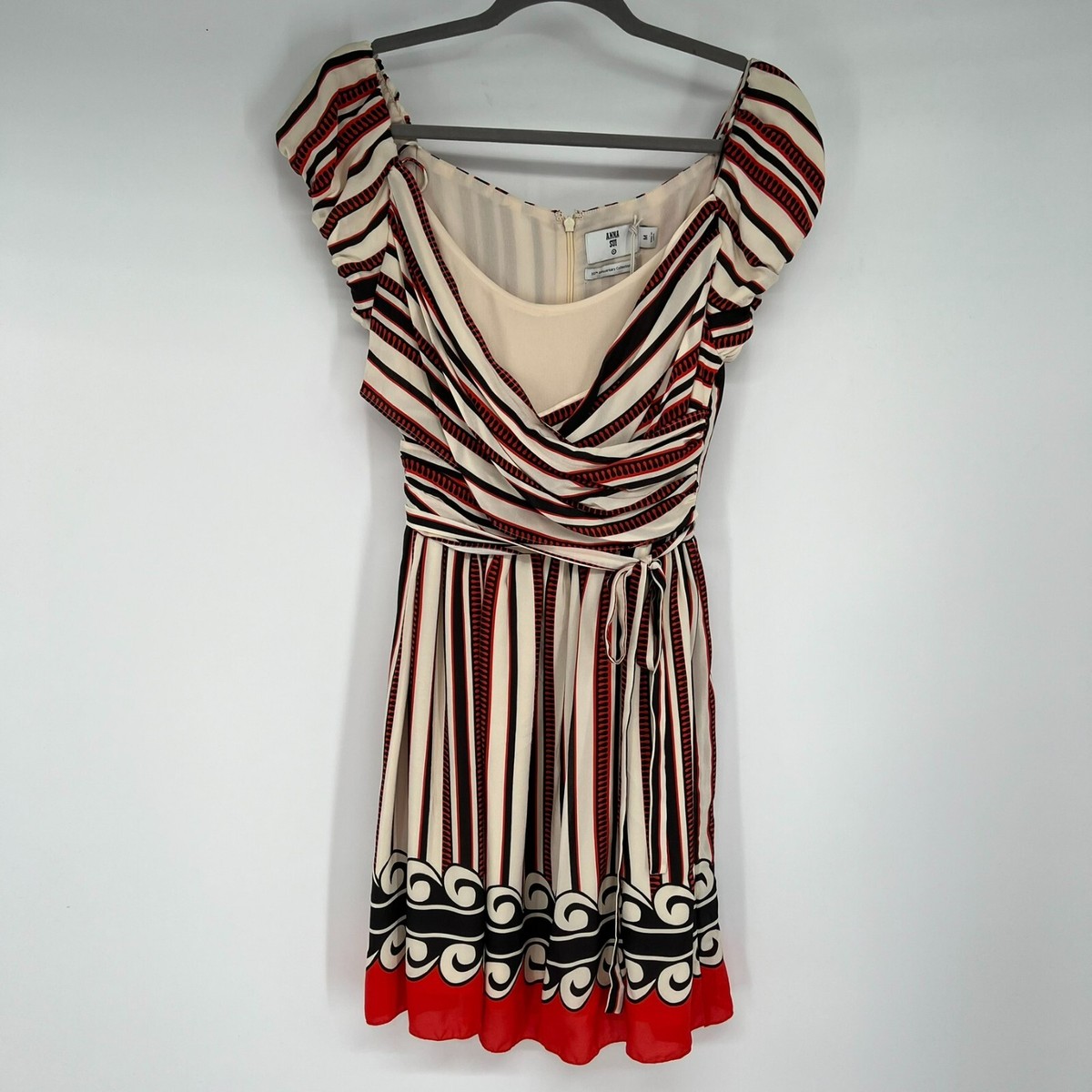 1920s fashion flapper dress Green with Sleeves chrissy Size:0 - (US0-2) Large Model Wears Women's Black Woven Asymmetric