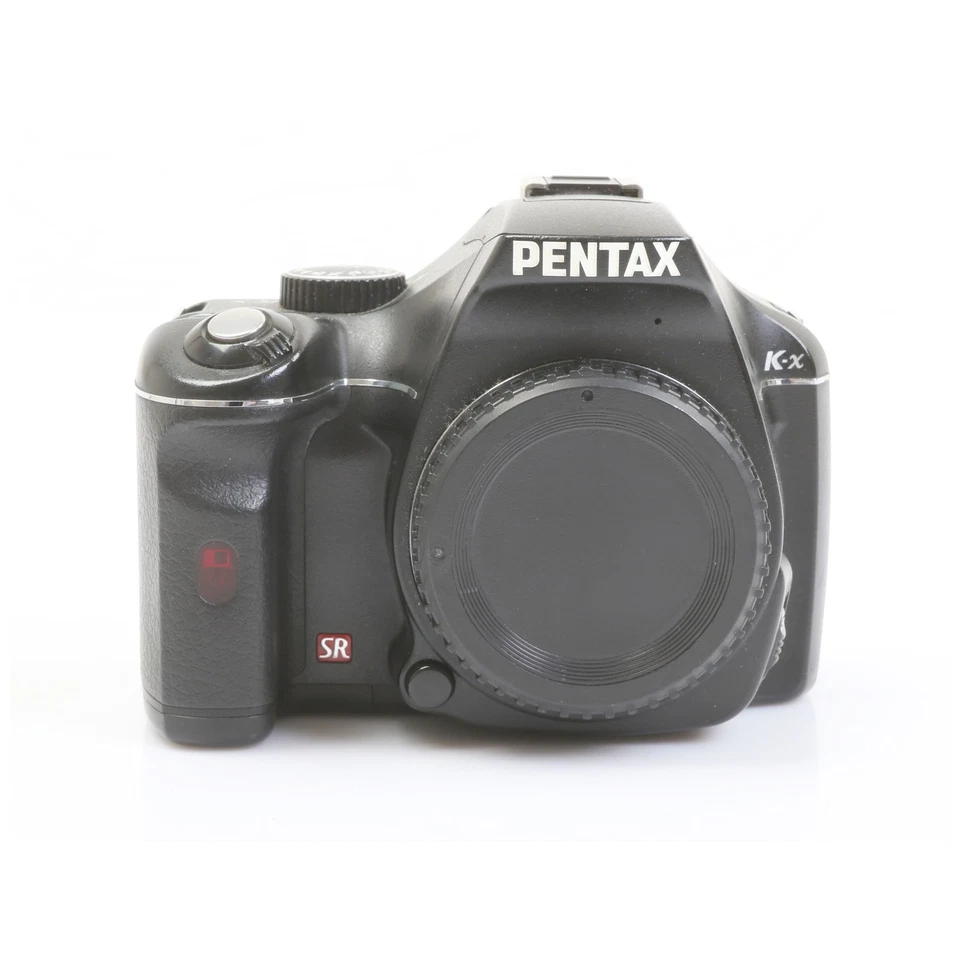 Pentax K-X SR + Sehr Gut (277044)